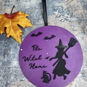 The Witch is Home Plaque